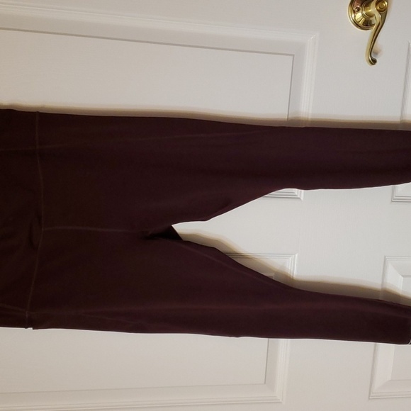 Athleta Pants - Athleta maroon leggings 7/8 length Size Medium pocket on side and on the…